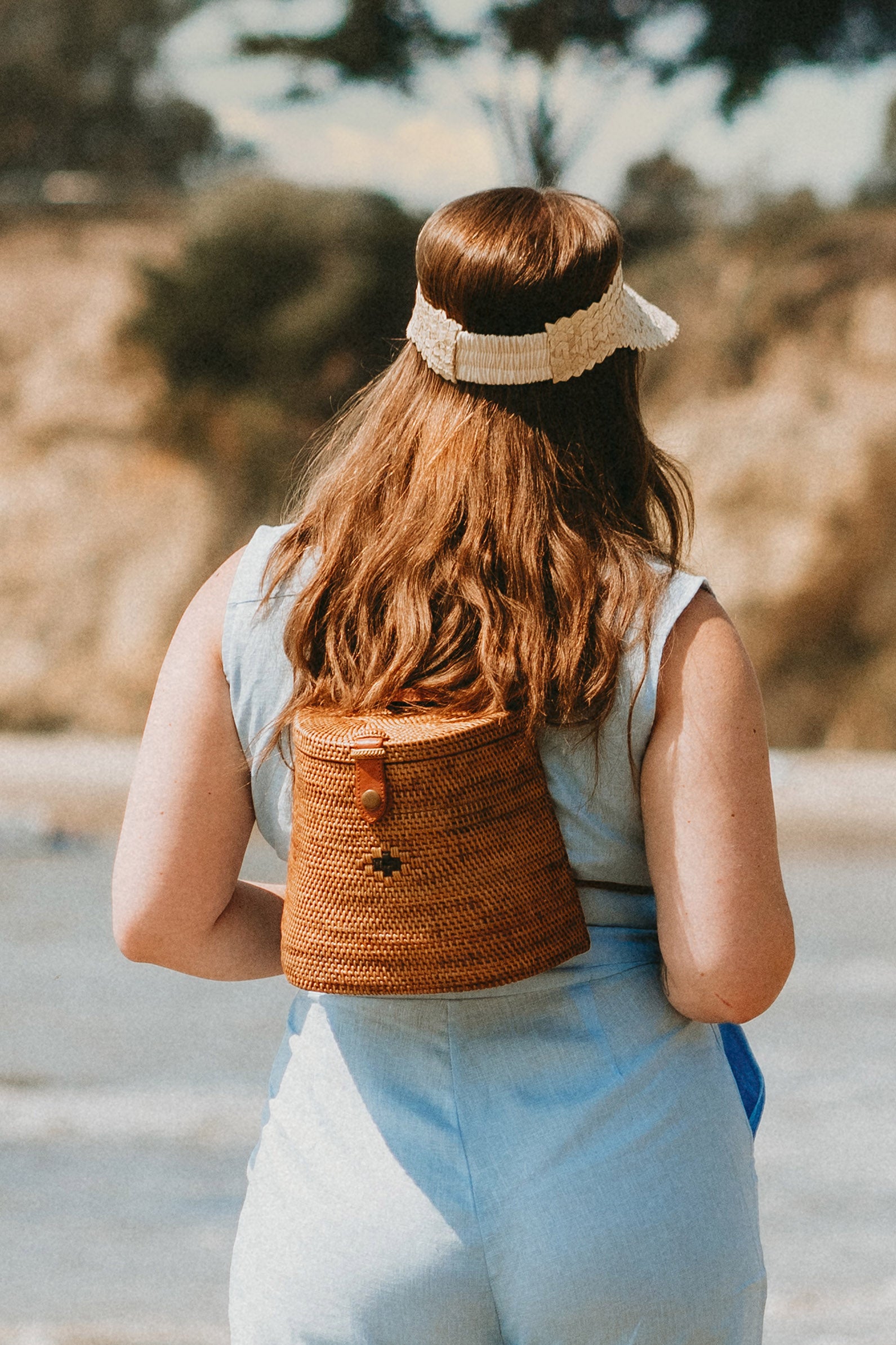 Model wearing Rattan Bali Backpack