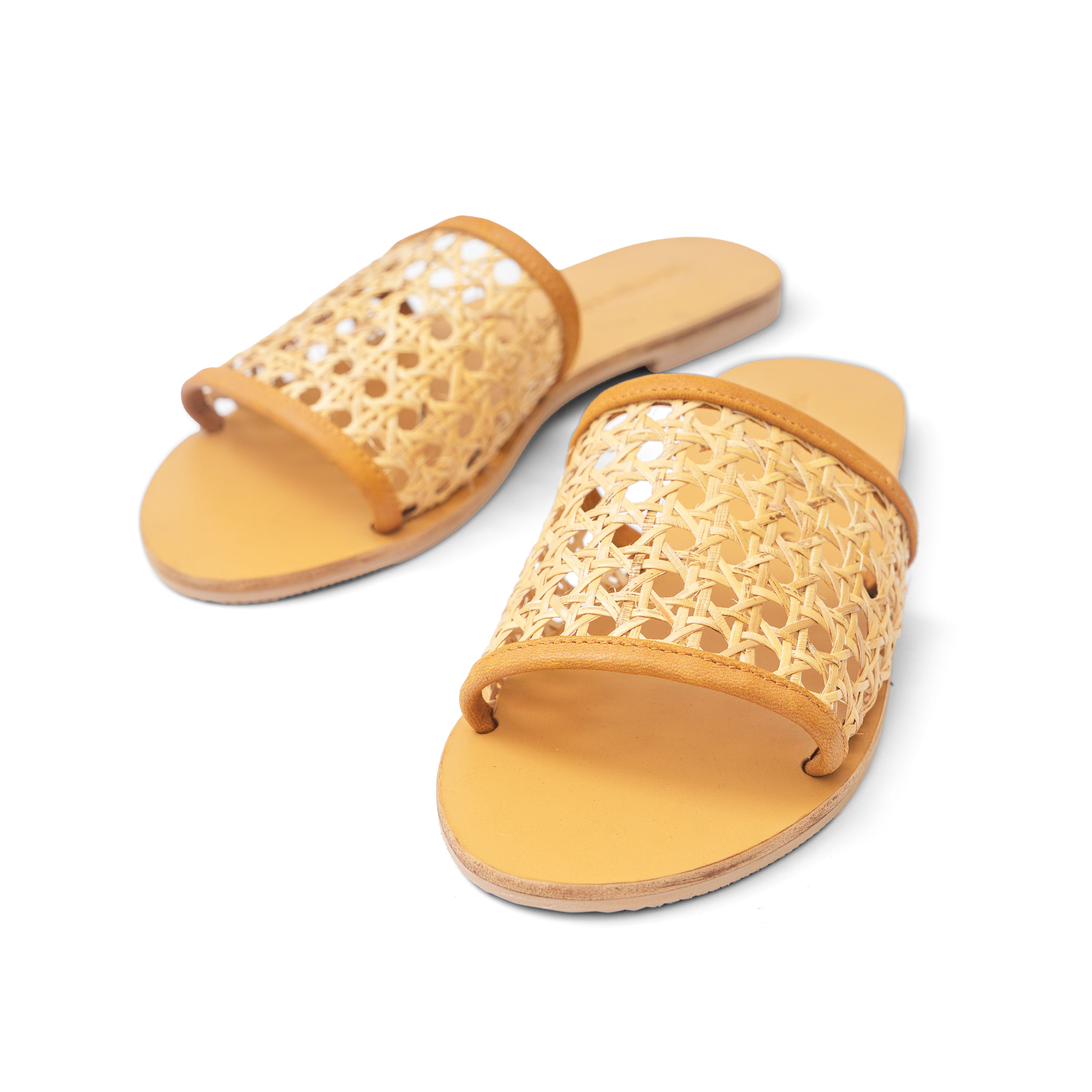 cane webbing rattan and tan leather sandal