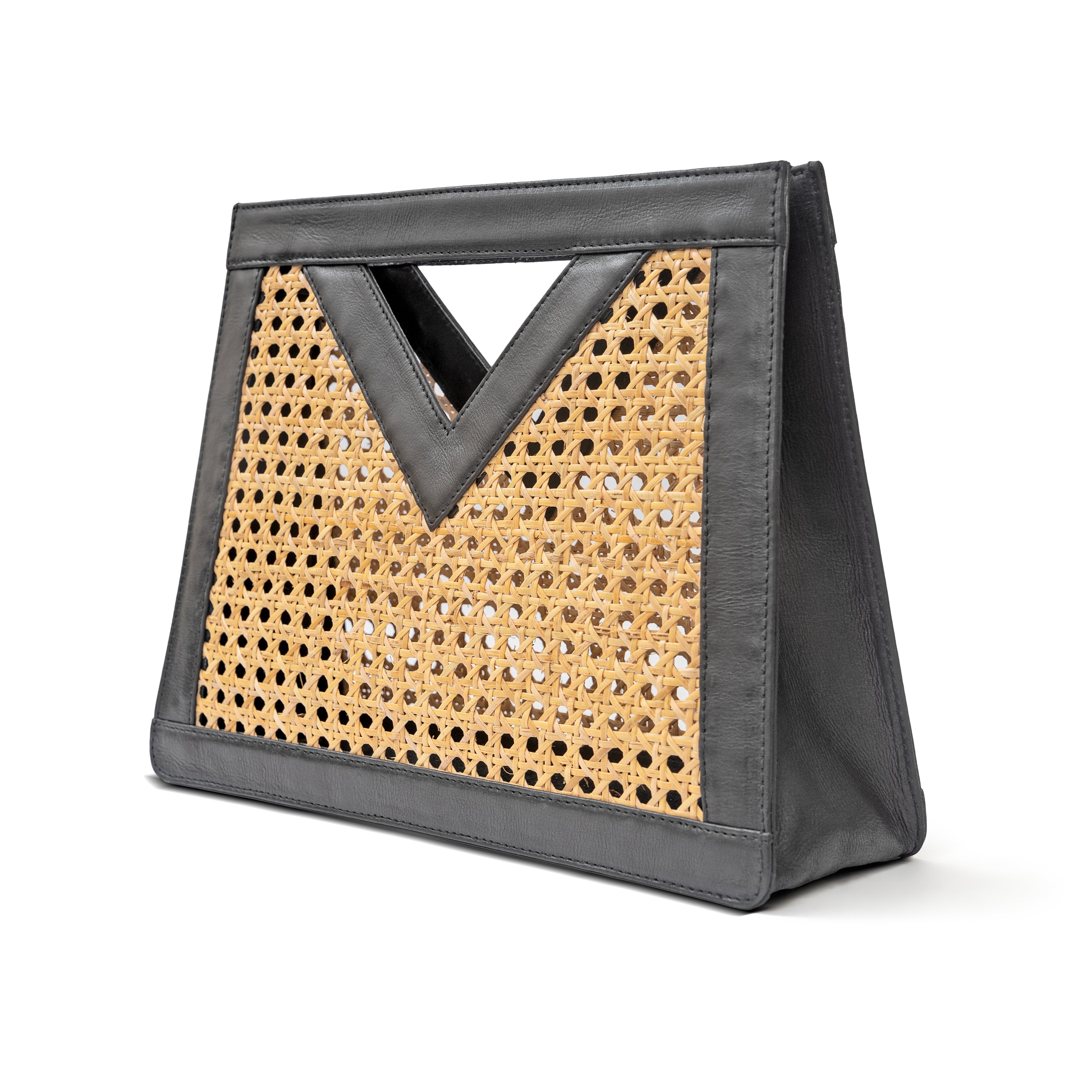Side view black leather trim and rattan cane webbing open weave top handle handbag