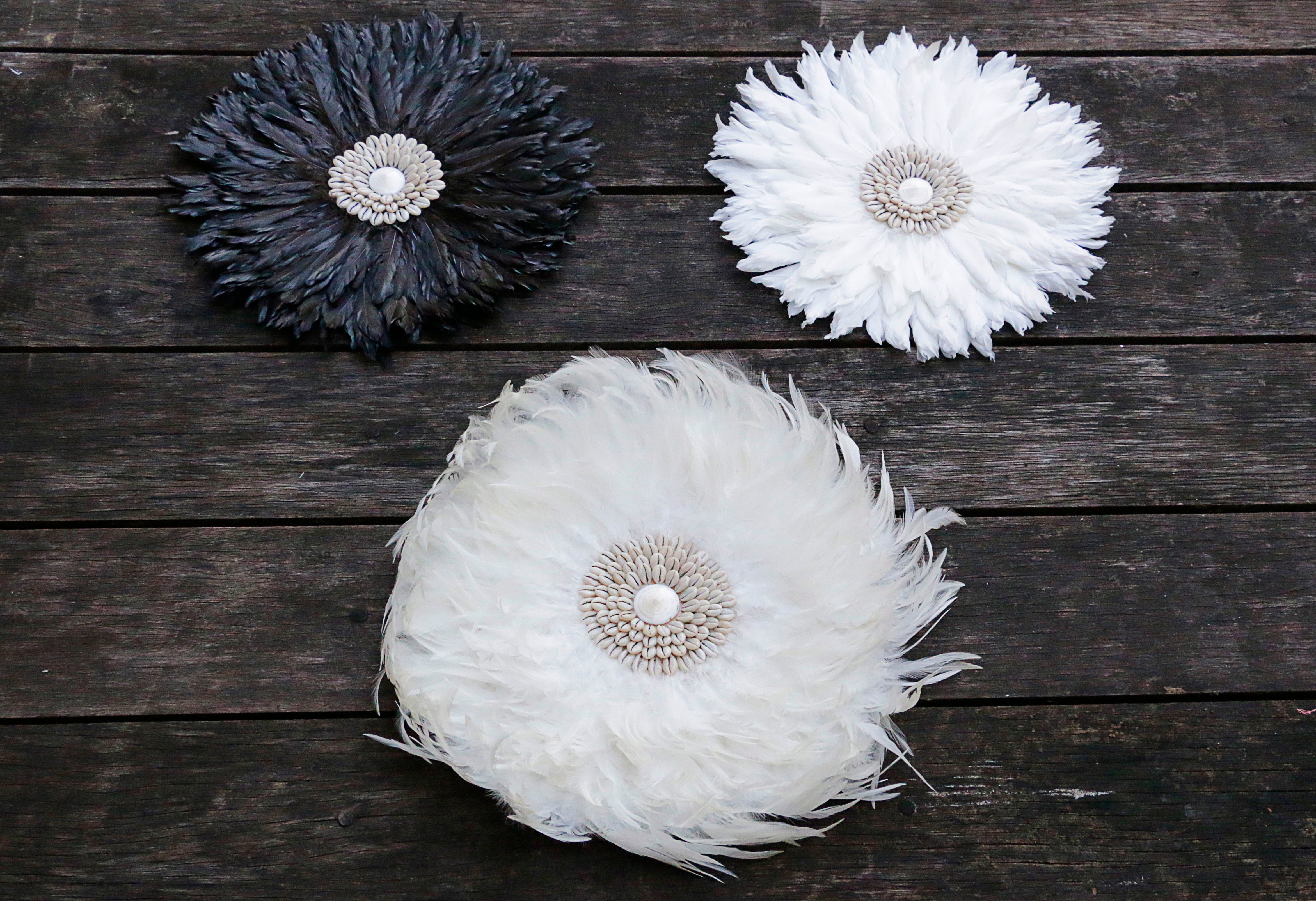 Three Juju Hat Hanging Wall Decor on Wood Floor