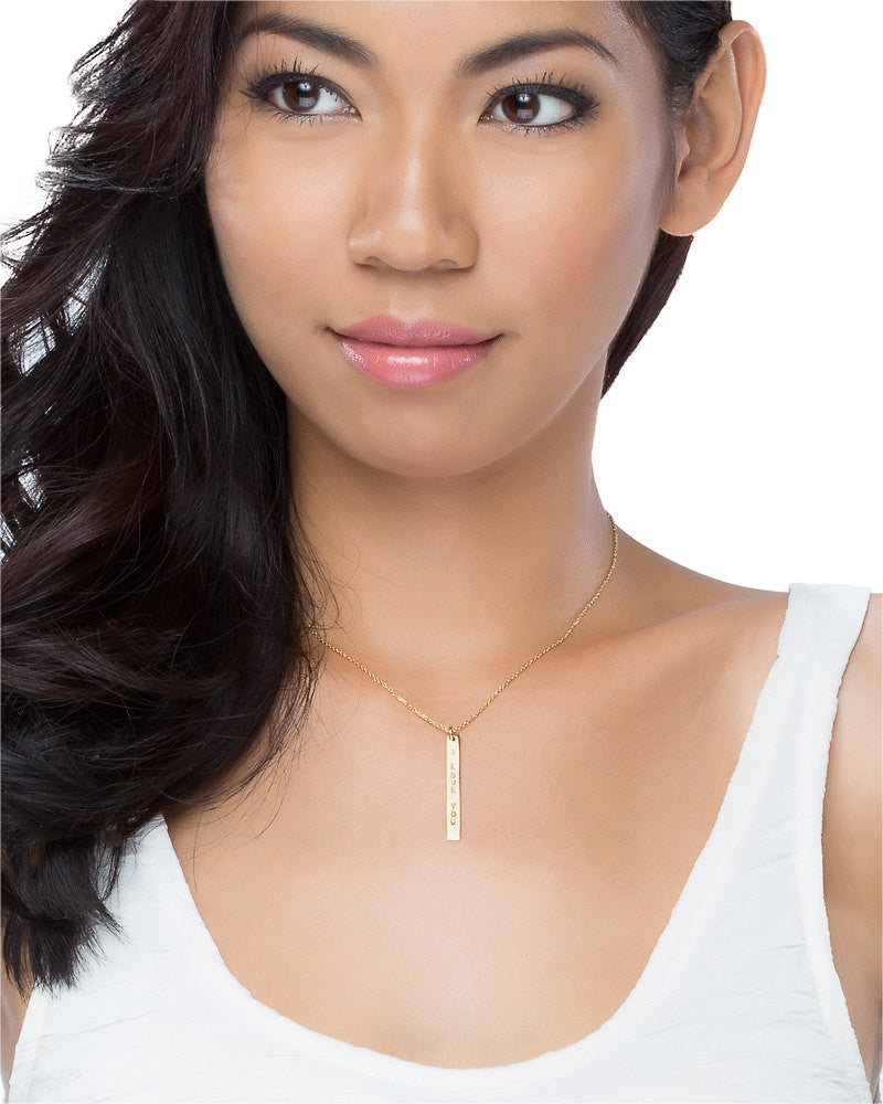 Model wearing 14k gold handstamped I love you Necklace 18" inches