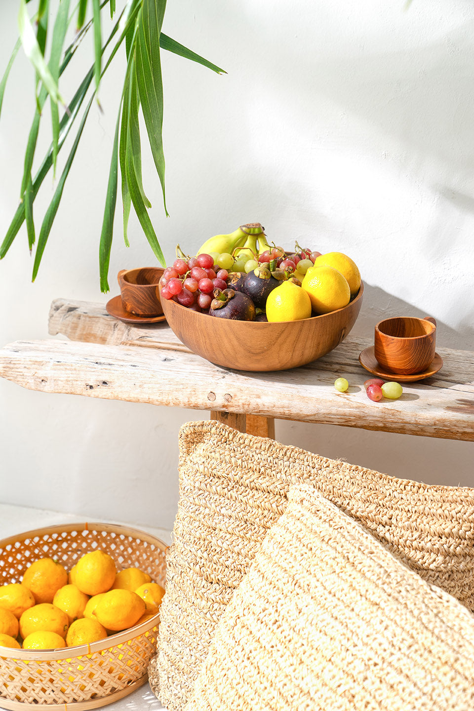Kitchen and Dining Tableware All Handcrafted In Bali Indonesia. Teak wood bowls, cups, cutting boards, serving spoons and trays.