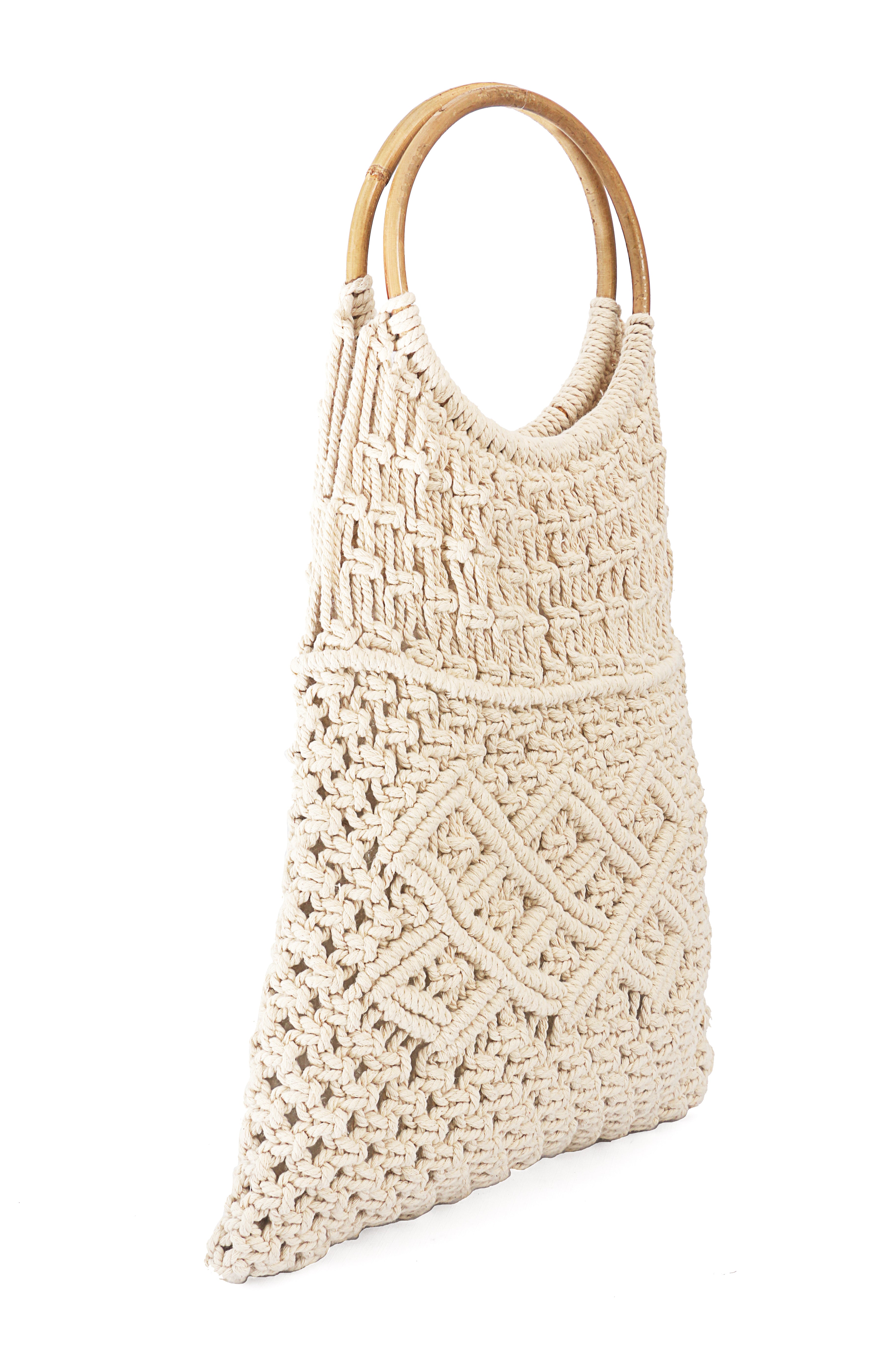 Side view beige macrame bag with handles