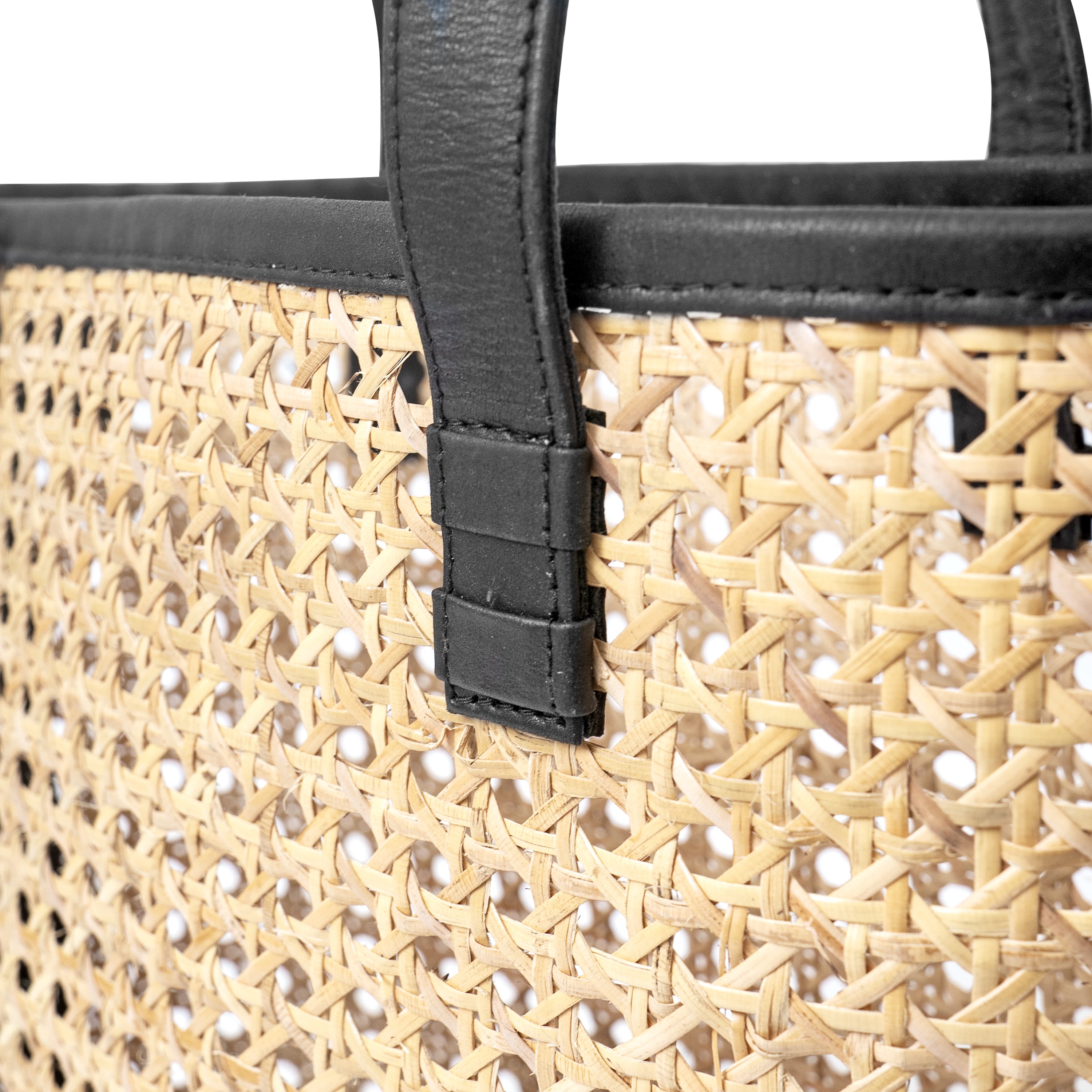 detail view genuine black leather trim and open weave cane basket shoulder tote handbag

