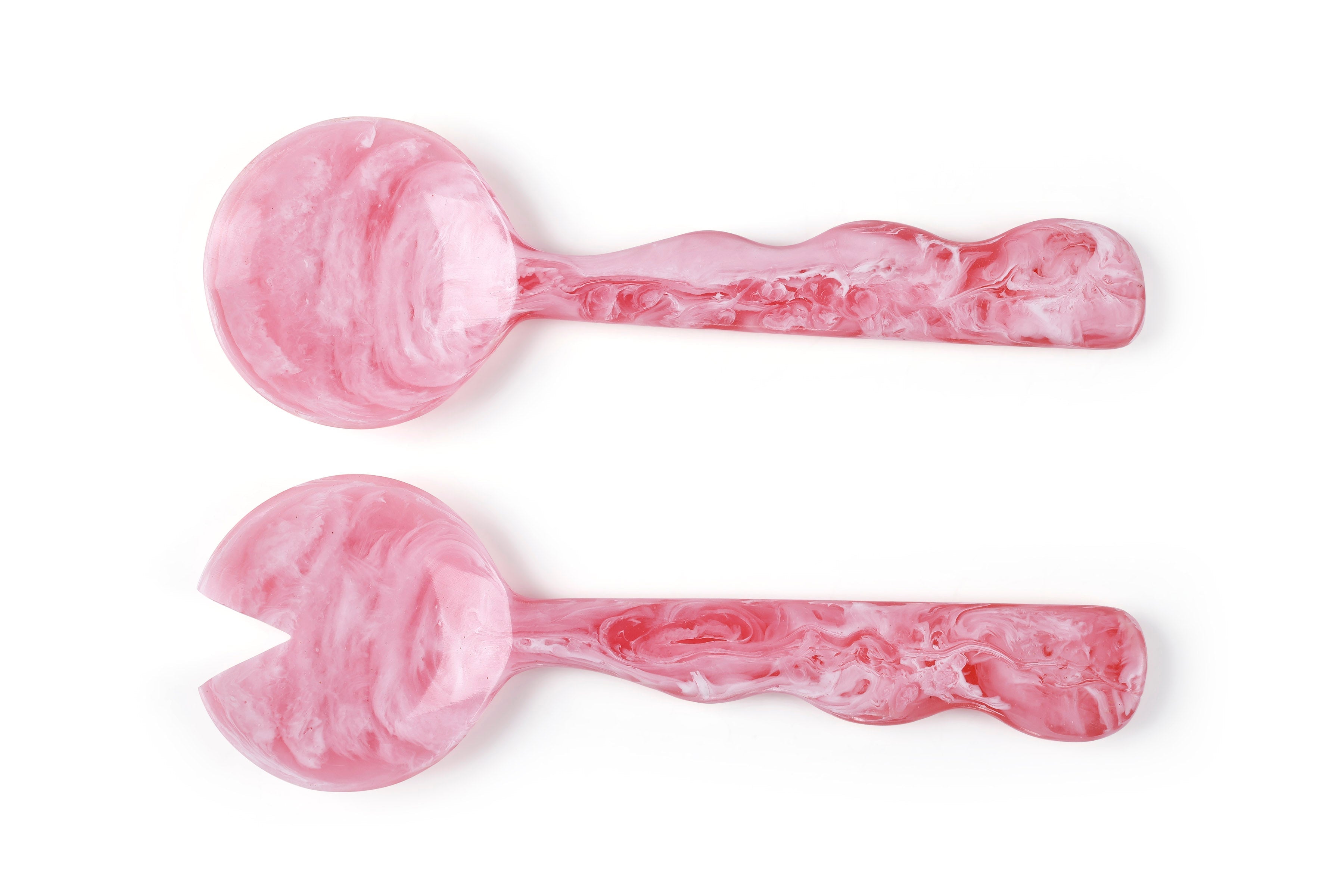 Two pink marbled pink salad server on a white background