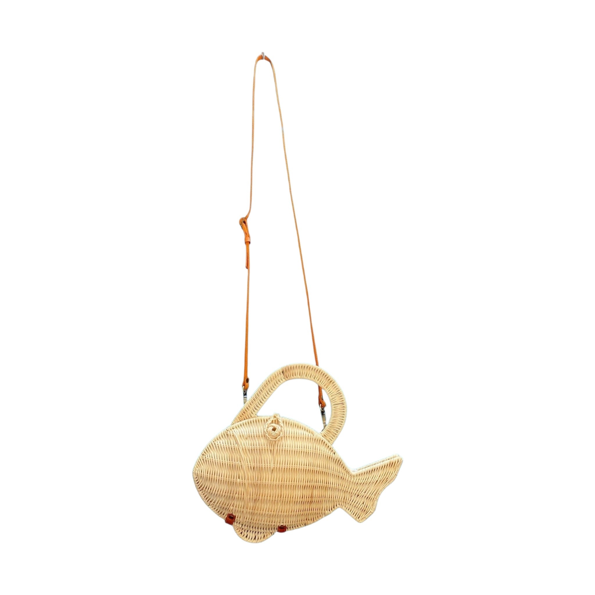 A woven fish-shaped shoulder bag made from natural rattan, with genuine leather brown crossbody shoulder strap. 