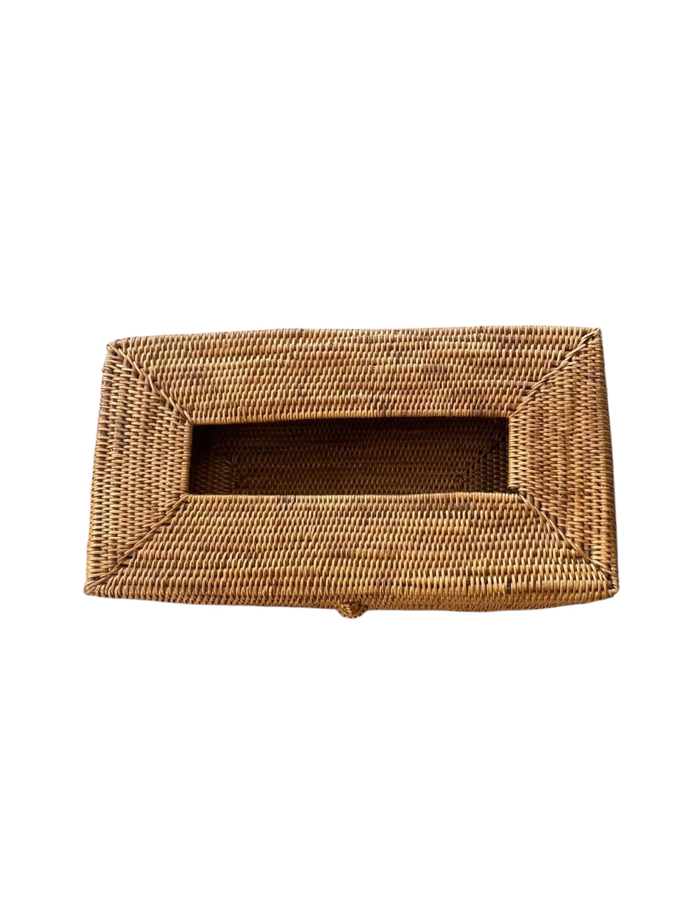 Artisan-crafted natural ata rattan rectangle tissue box holder with woven texture.