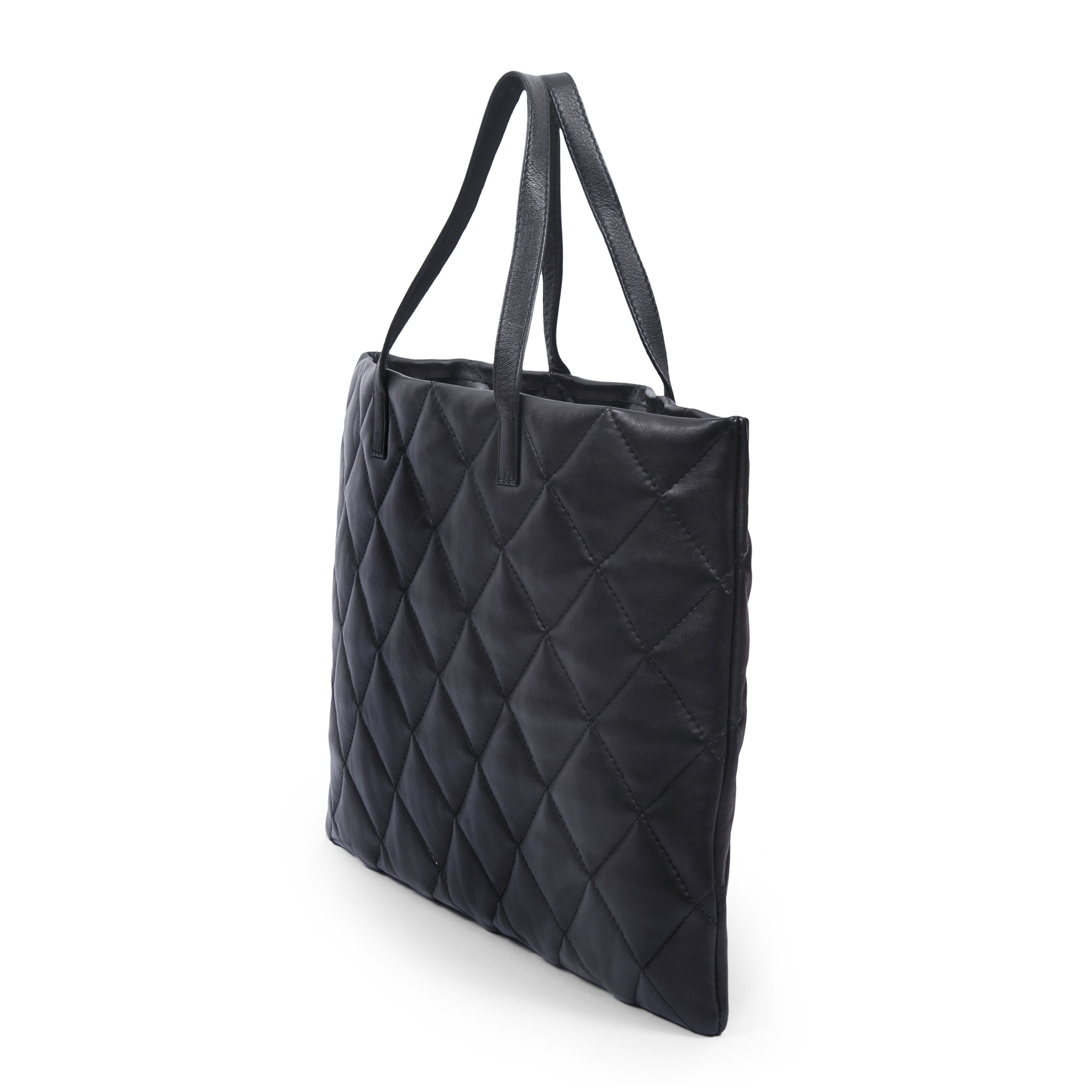 side view black quilted leather tote bag