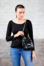crocodile texture patent leather drawstring purse; black drawstring bag; drawstring bag; sezane hope bag; calf hair purse; leather drawstring bag; bags and purses; handbag for women; affordable leather bags