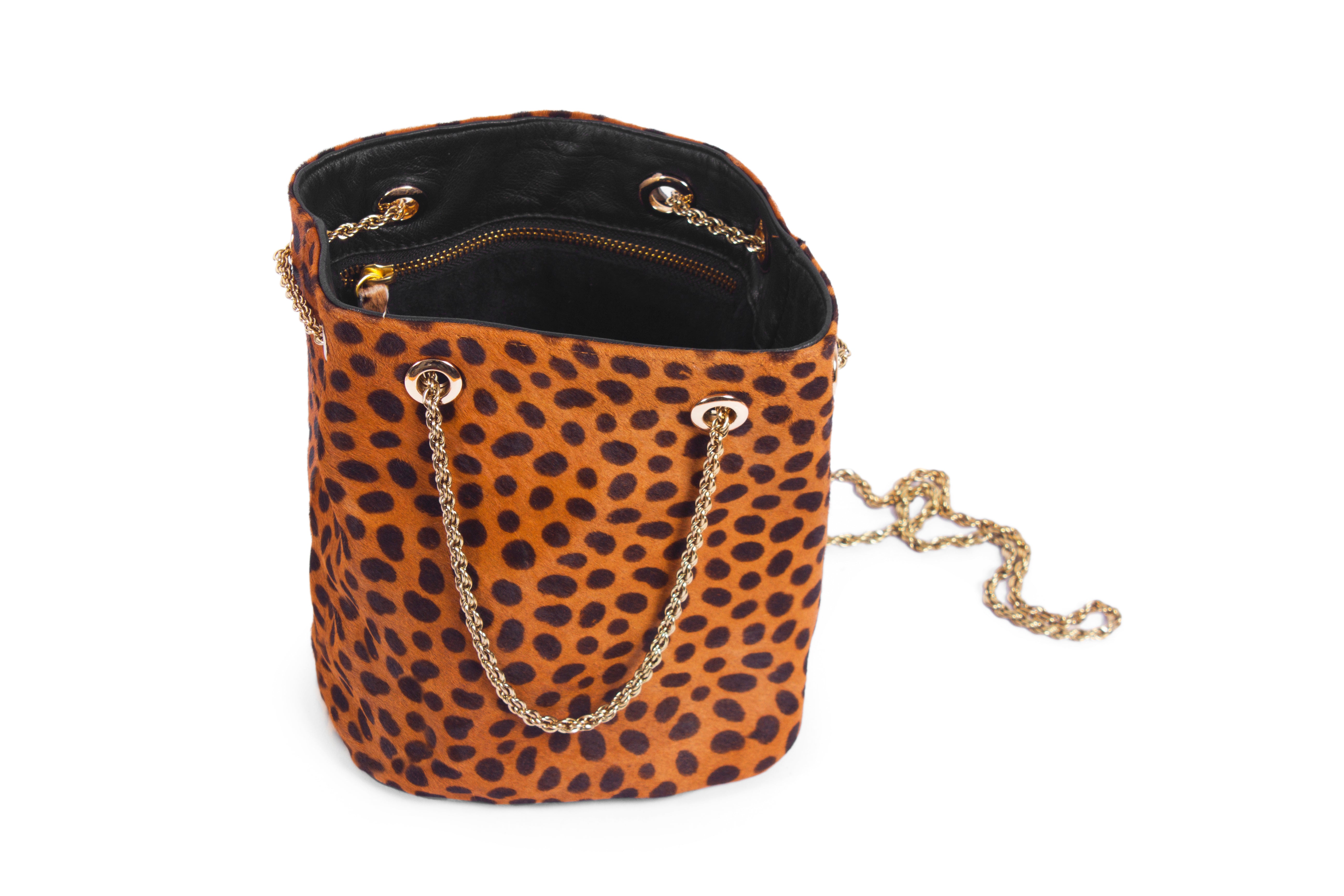 Inside view leopard drawstring crossbody purse