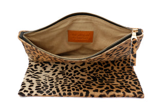 Inside view lining of leopard foldover clutch handbag