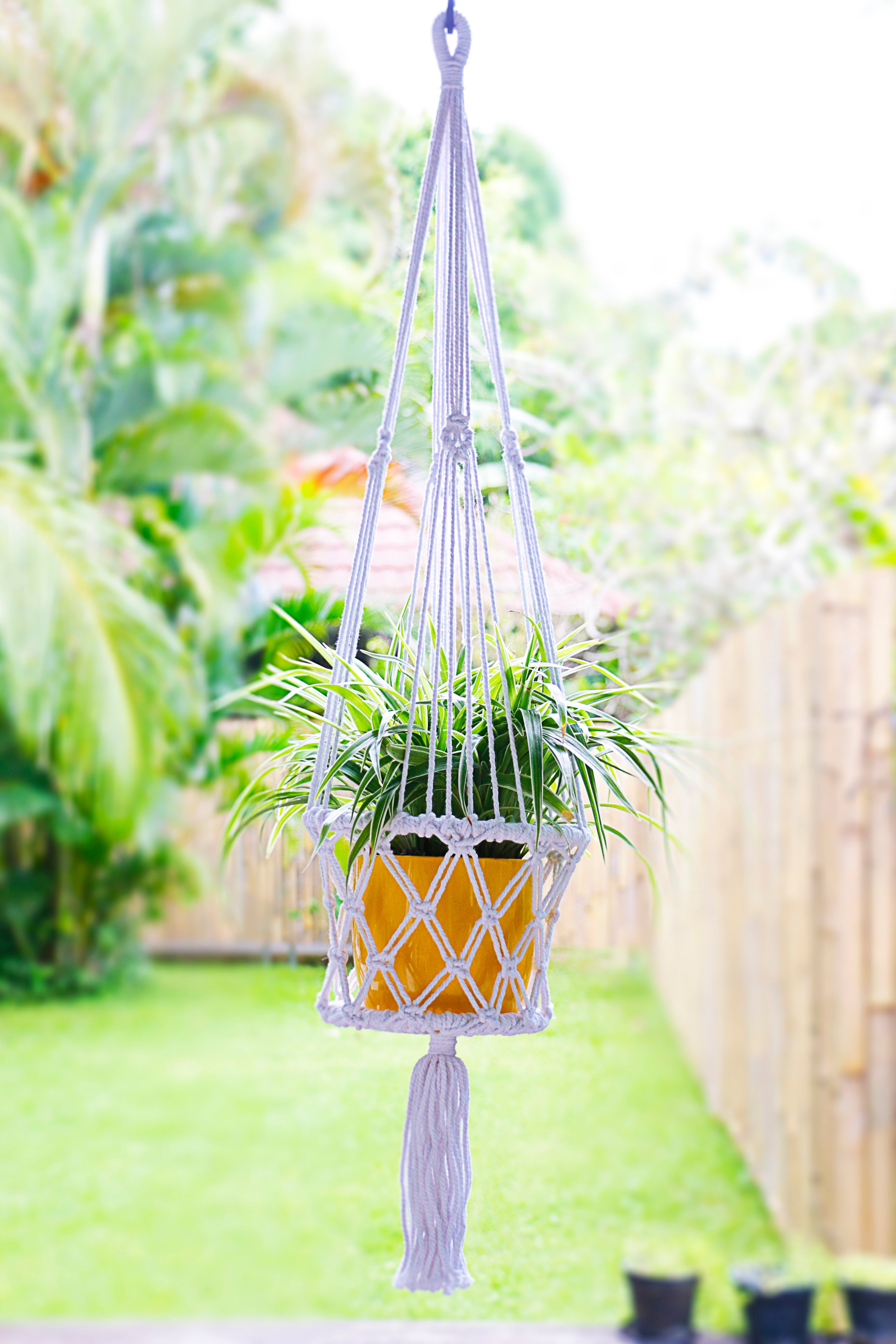 Macrame White Hanging Planter on deck and patio