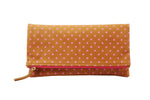 Clutch; Bags and purses; Foldover; Printed clutch; star pattern printed bag; star handbag; hot pink handbag; hot pink clutch; hot pink purse; Pink fashion accessories; print on leather bag; printed leather bags; leather foldover clutch
