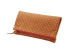 Hot pink clutch purse; hot pink fashion accessory; tan leather purse; tan leather clutch; foldover star purse; star printed bags; star printed handbags