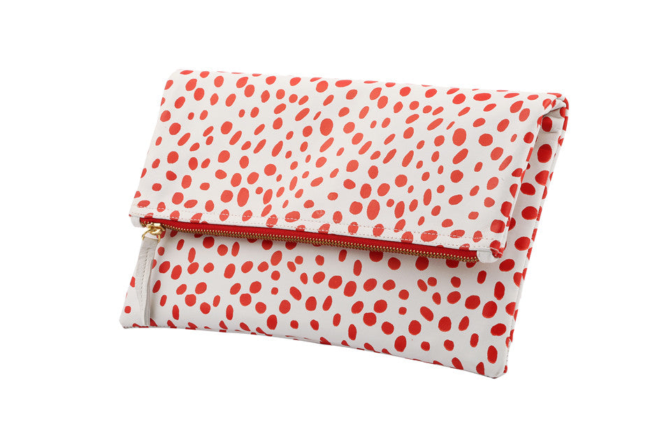 Spotted clutch; designer clutch; red spotted clutch; sophia webster; clutch; foldover clutch; foldover clutch pattern; dalmatian pattern clutch; dalmatian print clutch; leather clutch; red and white leather clutch; red and white clutch