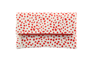Spotted clutch; designer clutch; red spotted clutch; sophia webster; clutch; foldover clutch; foldover clutch pattern; dalmatian pattern clutch; dalmatian print clutch; leather clutch; red and white leather clutch; red and white clutch