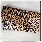 Styled view of leopard clutch handbag